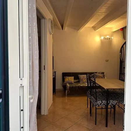 Cariddi House *