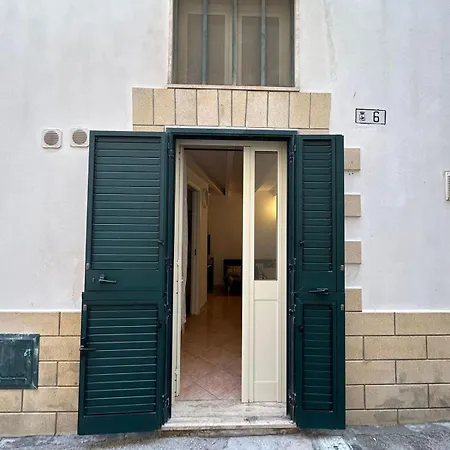 Cariddi House *